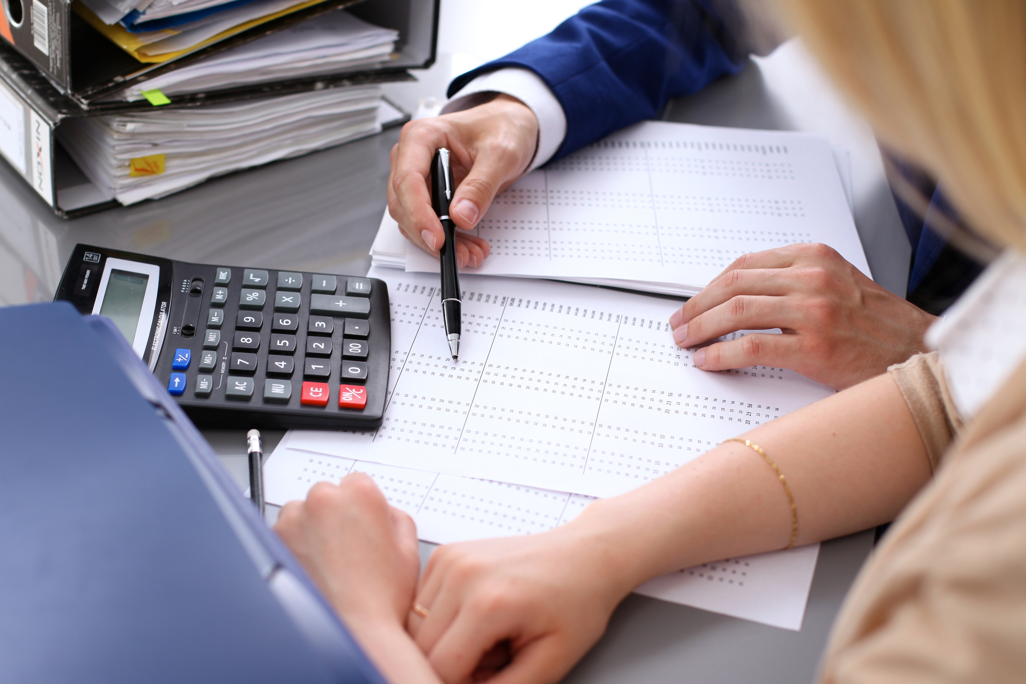 Financial Inspector And Secretary Checking Financial Document